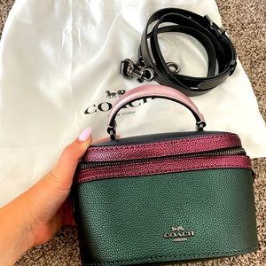 Beautiful metallic coach bag with strap ( never worn)